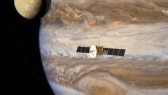 Künstlerische Illustration: Die Sonde JUICE vor dem Planeten Jupiter (Bild: ESA/AOES)