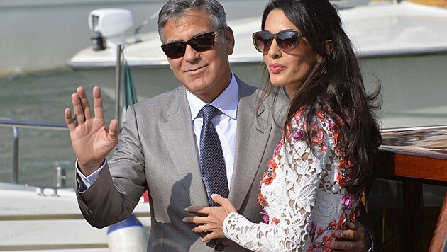 George und Amal Clooney bei den Hochzeitsfeierlichkeiten in Venedig (Bild: AFP)