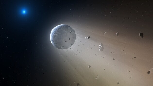 Die künstlerische Illustration zeigt den zerbröselnden Mini-Planeten. (Bild: CfA/Mark A. Garlick)