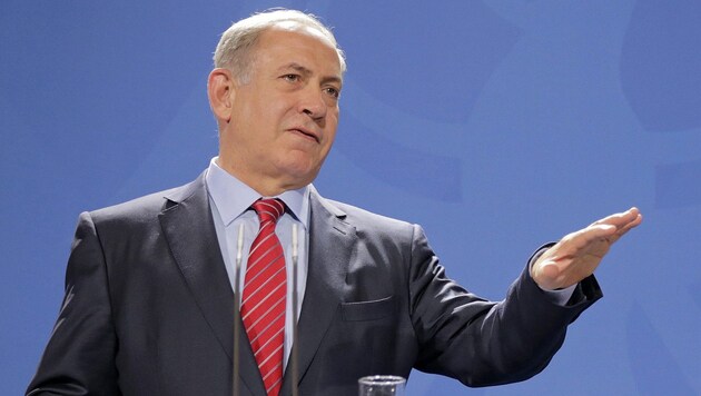 Israels Premier während einer Pressekonferenz in Berlin (Bild: APA/EPA/MICHAEL KAPPELER)