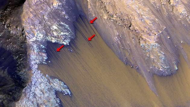 Fließstrukturen an den Valles Marineris am Mars (Bild: NASA/JPL-Caltech/University of Arizona)
