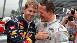 Zwei ganz Große der Formel 1: Sebastian Vettel (l.) und Michael Schumacher (Bild: APA/EPA/JENS BUETTNER)