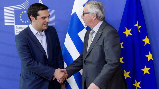 Alexis Tsipras und Jean-Claude Juncker (Bild: AP)