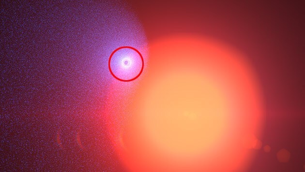 Künstlerische Darstellung des Exoplaneten GJ 436b (rot markiert) vor seinem Stern (Bild: University of Geneva (UNIGE))