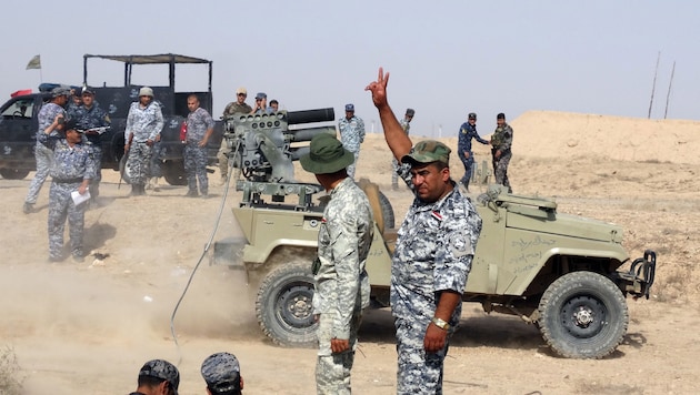 Sicherheitskräfte im Irak (Bild: AP)