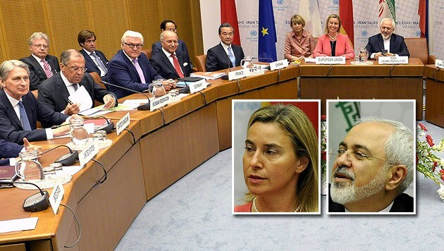 Die EU-Außenbeauftragte Mogherini und Irans Außenminister Zarif zeigten sich erleichtert. (Bild: APA/HERBERT NEUBAUER)