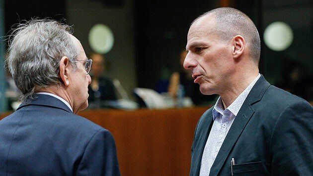 Griechenlands Finanzminister Yanis Varoufakis (re.) (Bild: APA/ EPA/JULIEN WARNAND)