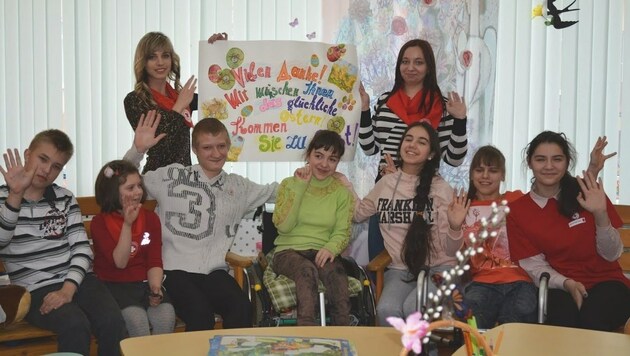 Die dankbaren Kinder des Tagesbetreuungszentrums Grodno in Weissrussland (Bild: Rotes Kreuz)