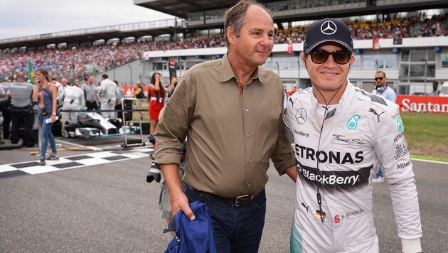 Gerhard Berger (li.) mit Mercedes-Pilot Nico Rosberg (Bild: APA/EPA/DAVID EBENER)