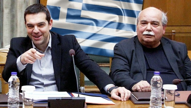 Griechenlands Premier Alexis Tsipras und Innenminister Nikos Voutzis (Bild: APA/ EPA/ALEXANDROS VLACHOS, thinkstockphotos.de)