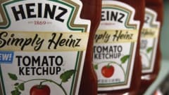 Kraft Foods und der Ketchup-Hersteller Heinz wollen zu einem neuen Lebensmittelriesen fusionieren. (Bild: AP)