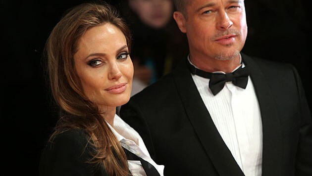 Angelina Jolie und Brad Pitt im Jahr 2014 (Bild: Joel Ryan/Invision/AP)