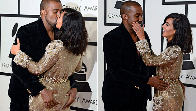 Kim Kardashian und Kanye West knutschen bei den Grammys. (Bild: APA/EPA/MICHAEL NELSON)