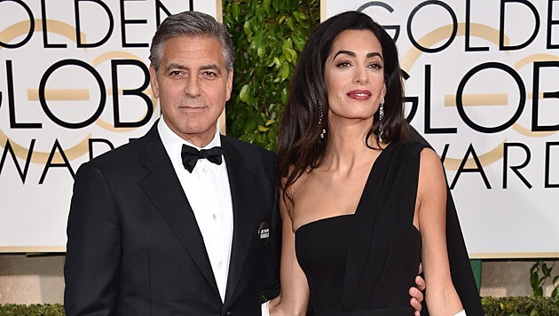 George Clooney und seine Amal (Bild: John Shearer/Invision/AP)