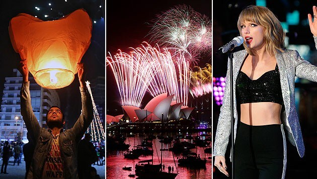 Im Libanon ließ man Laternen steigen, Riesenfeuerwerk in Sydney und Taylor Swift am Times Square. (Bild: AP, APA/EPA/JASON SZENES)