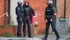 Sondereinsatzkräfte der belgischen Polizei am Ort der Geiselnahme (Bild: AP)