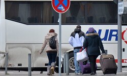 Migrantinnen und ein Migrant in Deutschland