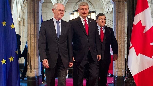 Herman Van Rompuy, Kanadas Premier Stephen Harper, José Manuel Barroso (Bild: AP)