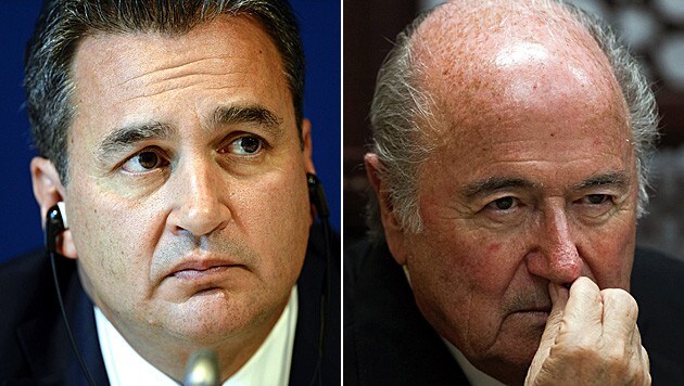 Michael Garcia (li.) und Sepp Blatter (re.) (Bild: AP, APA/EPA/ATEF SAFADI)