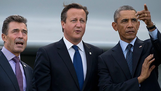 NATO-Generalsekretär Rasmussen mit dem britischen Premier Cameron und US-Präsident Obama (Bild: AP)