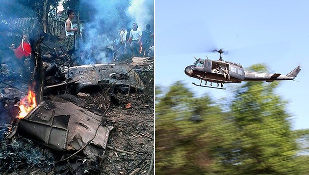 Der Helikopter (li.) stürzte in der Nähe der vietnamesischen Hauptstadt Hanoi ab. (Bild: AP/APA/EPA/Vnexpress.net)