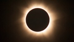 Eine totale Sonnenfinsternis veranlasst Astronomen zu einer Warnung vor Online-Händlern wie Temu. (Bild: EPA)