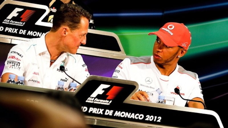 Michael Schumacher und Lewis Hamilton. (Bild: EPA)