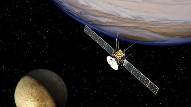 Künstlerische Illustration: Die Sonde JUICE nahe des Jupiters (oben) und eines seiner eisigen ...